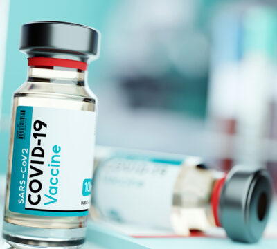 vial of covid 19 vaccine in a medical research lab