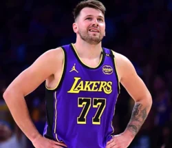 luka doncic reacts to a play during a game against the dallas mavericks