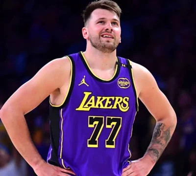 luka doncic reacts to a play during a game against the dallas mavericks